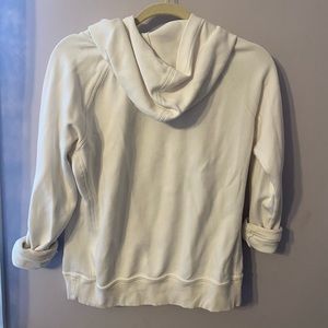 White Aritzia Community turtleneck hoodie